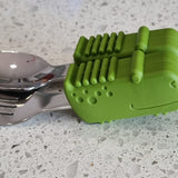 Meal time babies first palm grasp fork and spoon