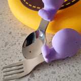 Meal time babies first palm grasp fork and spoon
